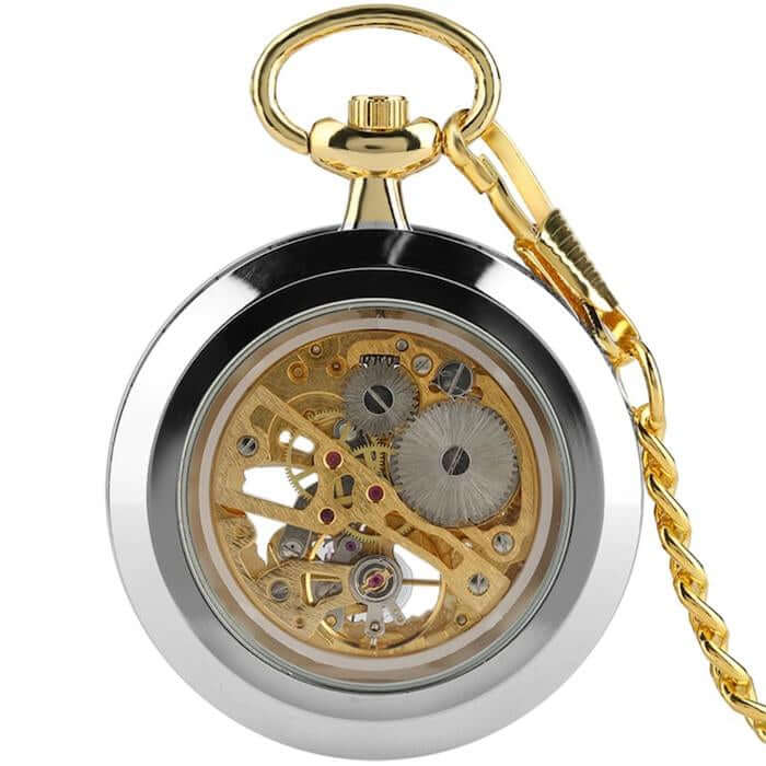 Silver and gold pocket watch with visible gears.
