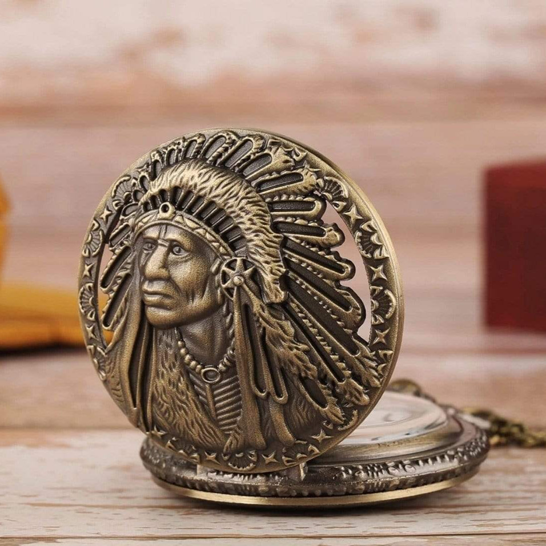Bronze pocket watch with Native American headdress design.