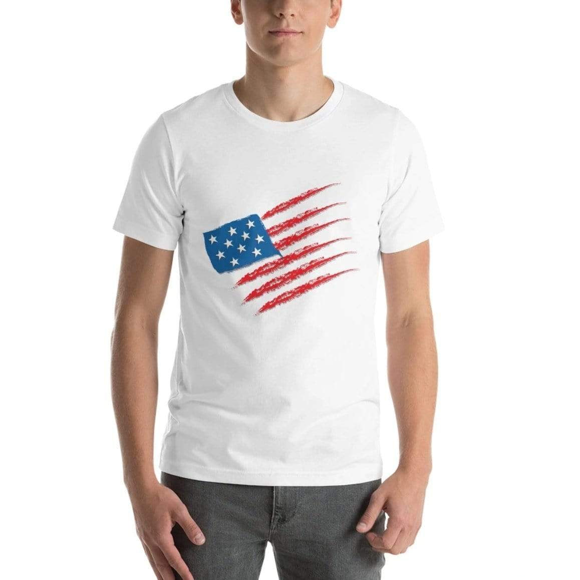 Man wearing a white t-shirt with a distressed American flag design and gray jeans.