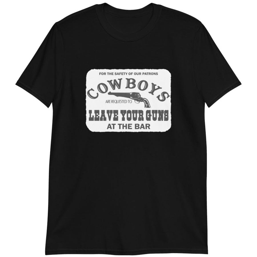 Black T-shirt with graphic text "Cowboys are requested to leave your guns at the bar" with a revolver image.