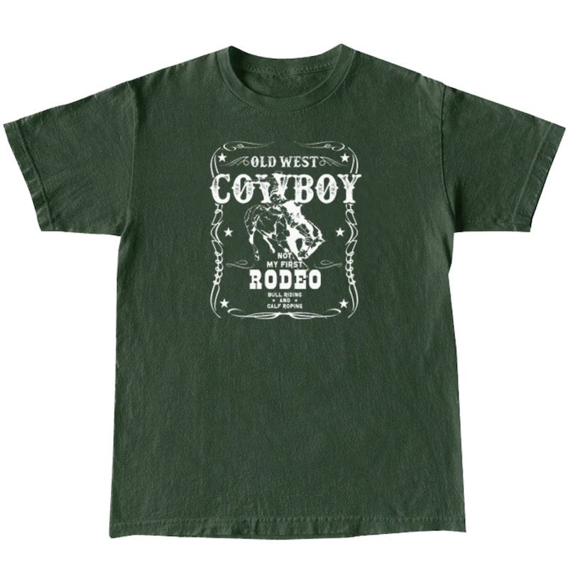 Forest green t-shirt with a cowboy and rodeo graphic.